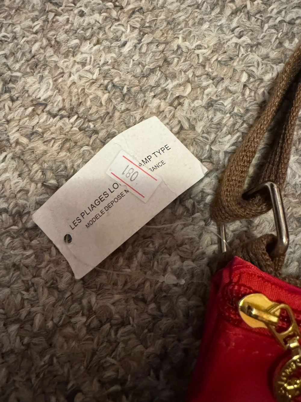 Longchamp Red Crossbody Bag with Brown Strap and Gold Accents